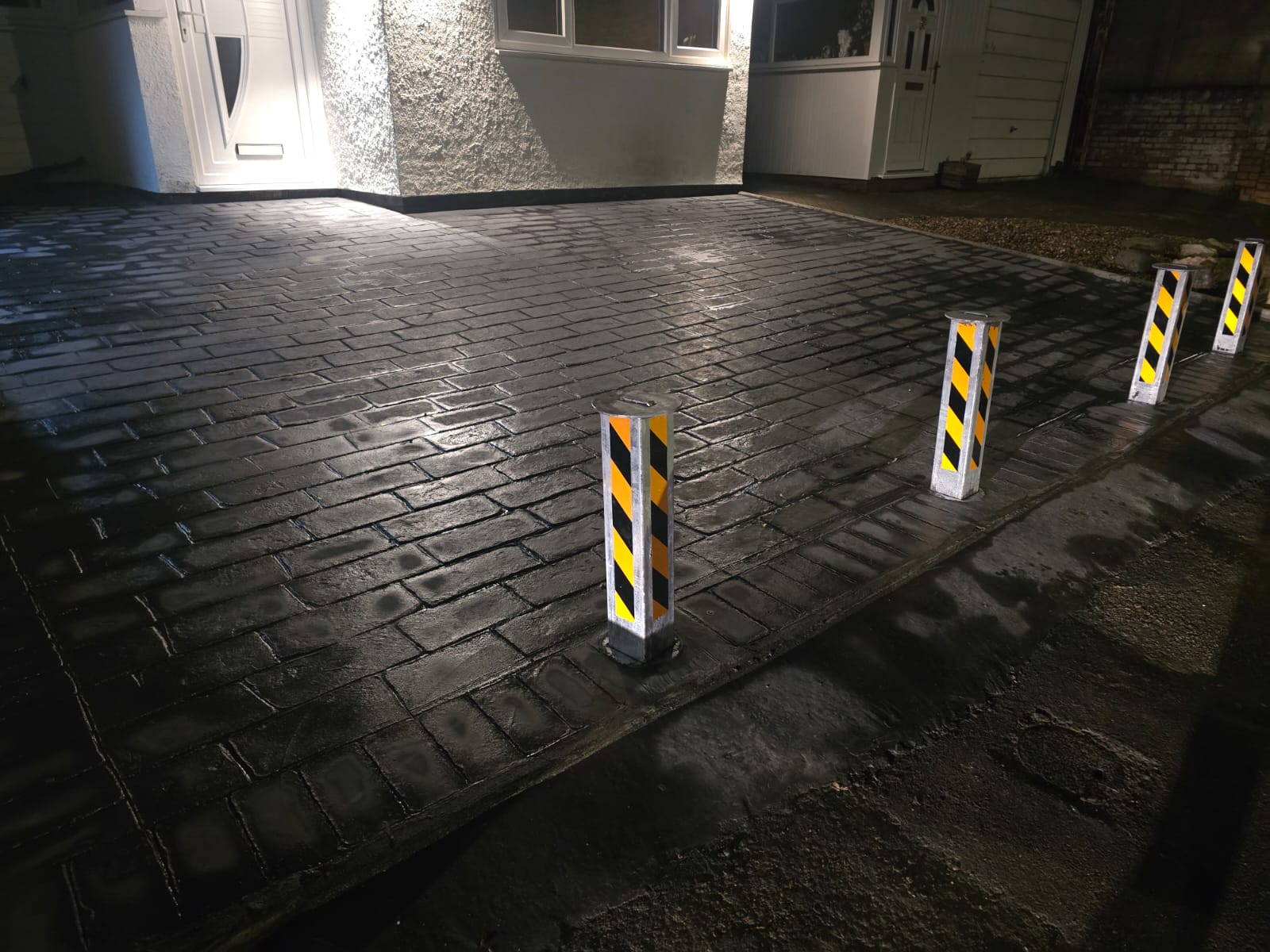 Concrete security bollards installed by Toor Concrete Driveways in the West Midlands